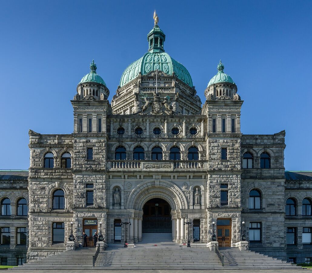 The domed British Columbia Parliament Building in Victoria with lawns in front