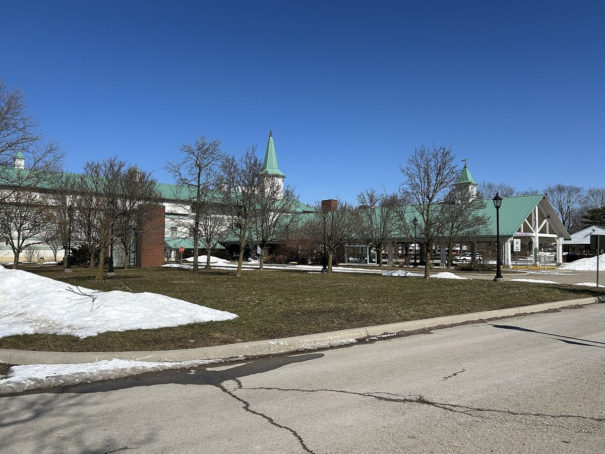 Fort Erie Race Track buildings with green roofs and spires on a sunny winter day