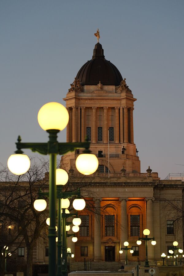 The Manitoba Legislative Building in winter, with the Golden Boy statue on its dome