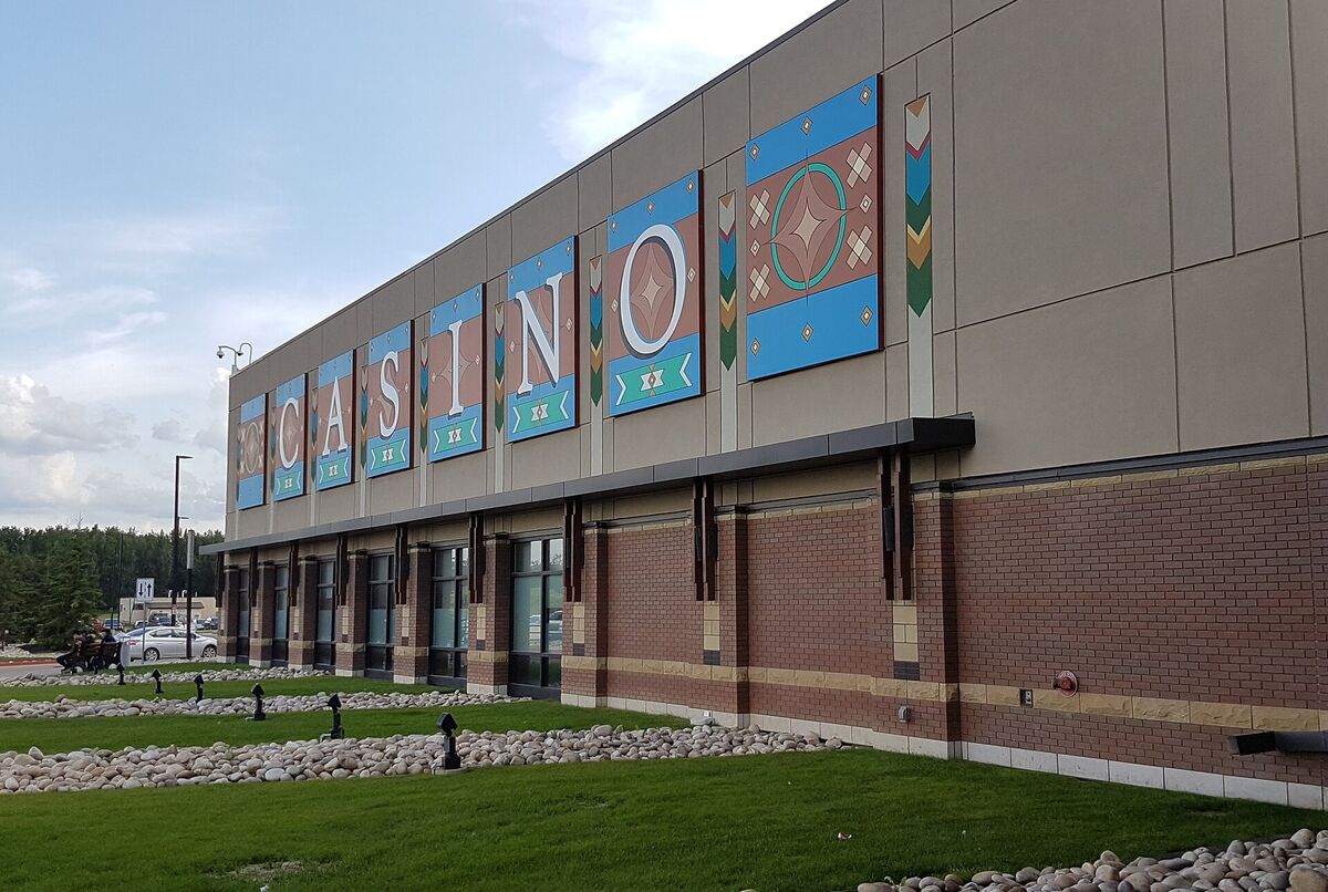 Large CASINO lettering on decorated panels along the brick and stucco wall of River Cree Casino