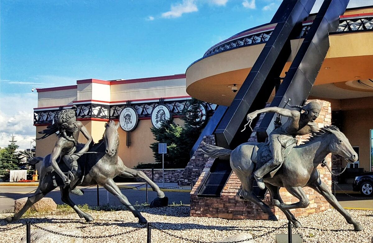 Bronze horse and rider sculptures outside Painted Hand Casino in Yorkton, Saskatchewan
